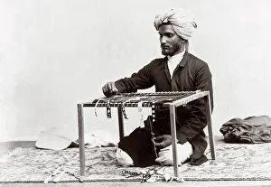 Viewer: c. 1880s India - man working with cloth