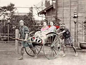Rickshaw: c. 1880s Japan - geishas in a rickshaw