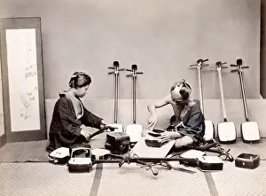Geisha: c. 1880s Japan -making a shamisen