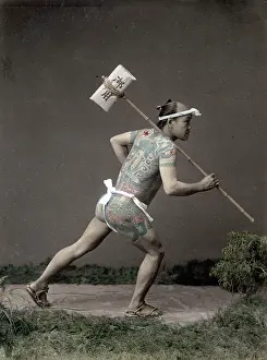 Tattooed: c.1880s Japan - tattooed post runner with a letter