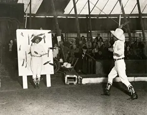 Bertram: c.1920's - flaming knife throwing act, Bertram Mills circus