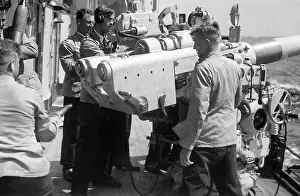 Ensign: Cadets of the Navy at a naval gun