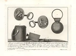 Waxed: Cameo rings, gold bauble and writing tools