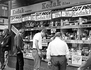 Bargains: IN FRONT OF CAMERA SHOP