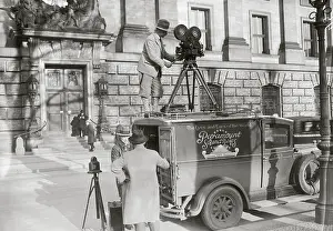 Convenes: Cameras in front of Reichstag