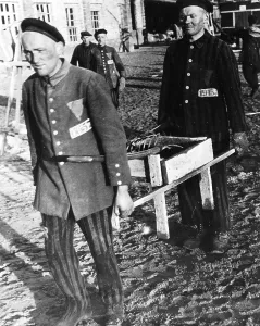 Prewar: Camp internees in striped uniforms doing forced labour at Sa