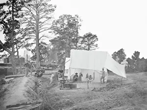 Kettle: Camp scene showing cook's tent during the