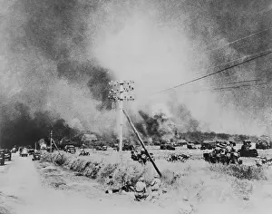Lcgr1407: Canadian troops and armed vehicles advance along