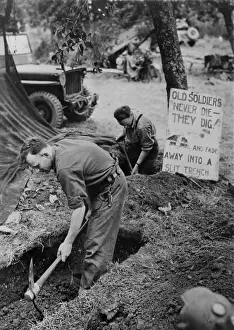 Fade: Canadian troops in Normandy digging trenches outside