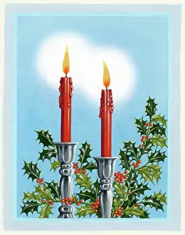 Candlesticks: Two candles with holly