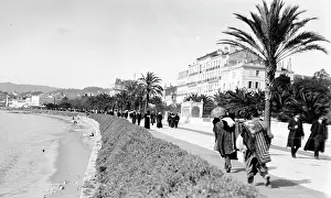 Promenading: Cannes beachfront
