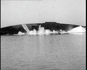 Capsized: A Capsized Italian Ship Being Righted