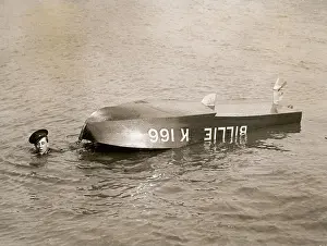 Capsized: Capsized participant of motor boat race