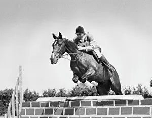 Versatile: Captain Mark Phillips in show jumping event, Cornwall