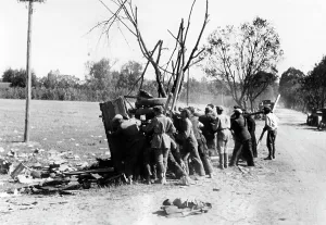 German Soviet: Captive Red Army soldiers clear a road on the Eastern Front