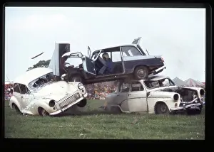 Car crashing through front of truck