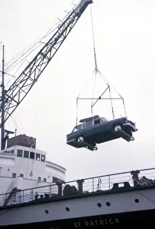 Ferries: Car being loaded onto a ferry