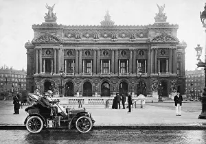 Garnier: A car in front of the Opera House Garnier in Paris, 1908