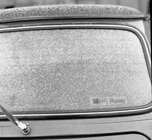 Tony Boxallfrps: Car windshield covered in powdery snow