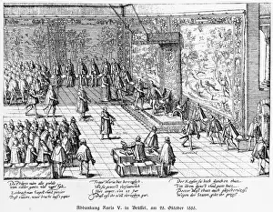 1555: CARL V ABDICATES