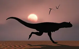 Triassic: A Carnotaurus dinosaur silhouetted against the