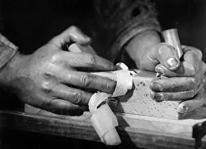 Planing: Carpenter planing, 1940