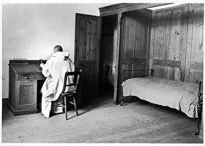 Carthusian monk in his cell