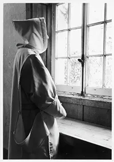 Parkminster: Carthusian monk standing at a window