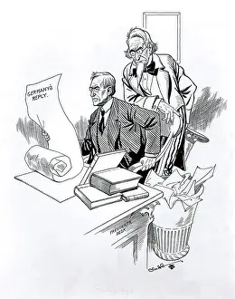 Woodrow: Cartoon, President Wilson reading German's Reply