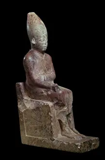 Statuettes: Carved limestone statue of King Khasekhem