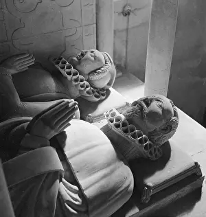Recumbent: Carved tomb