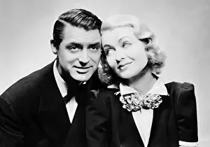 Topper: Cary Grant and Constance Bennett in The blonde ghost, 1937