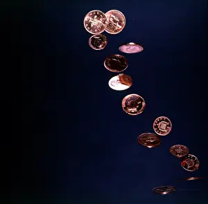 Pence: A cascade of coppers - a falling flurry of 1p and 2p pieces
