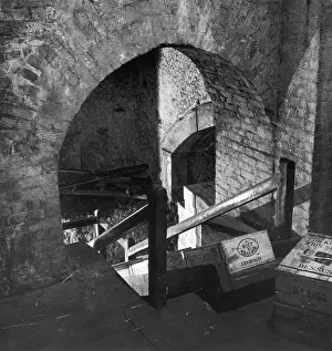 Cellar: Cases of Moet & Chandon Champagne in a brick cellar