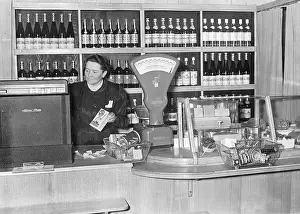Cashier: Cashier in a grocery store, 1942