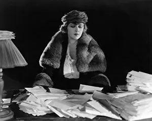 Businesswoman: Catching up on correspondence