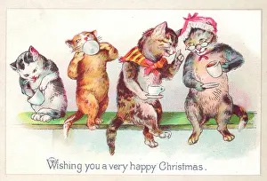 Victorian Christmas: Four cats drinking tea on a Christmas card