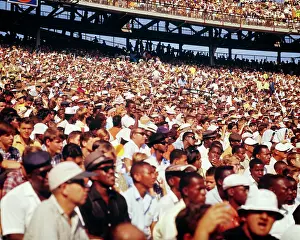 Throng: Caucasian and African-American Diverse Crowd at