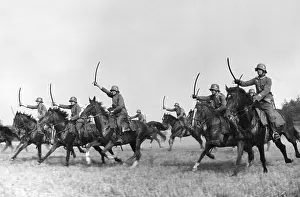 Troopers: Cavalry of the Wehrmacht practicing the attack with draw