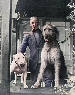 Mary Evans (colourised): Cecil Aldin with two dogs
