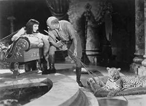 Colbert: Cecil B DeMille and Claudette Colbert during the filming of