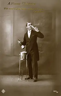 Grenville Collins / Tom Gillmor Collection: Celebrating Christmas with a bottle of champagne for one