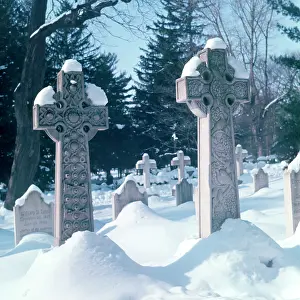 Two Celtic Cross Grave Markers in Cemetery in