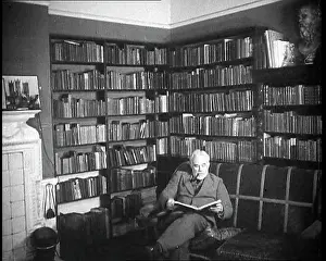 Joad: C.E.M Joad Reading a Book