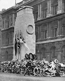 Tributes: The Cenotaph covered in flowers, November 1920