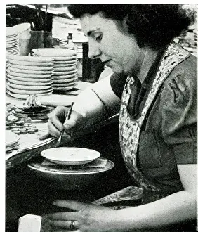 Skilled: Ceramics artist edge-lining china