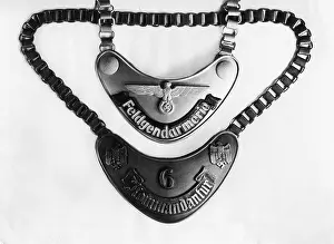 Gorget: Chain collar of a military policeman