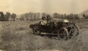 Chaps: Two chaps in a sporty 20s motor