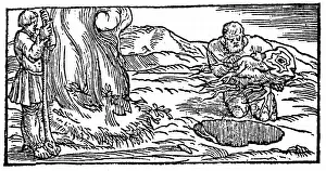 Charcoal: Charcoal burning: Pit being filled with wood (right)