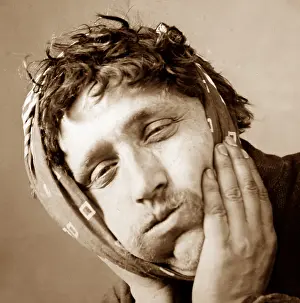 Toothache: Charicature of a man with toothache